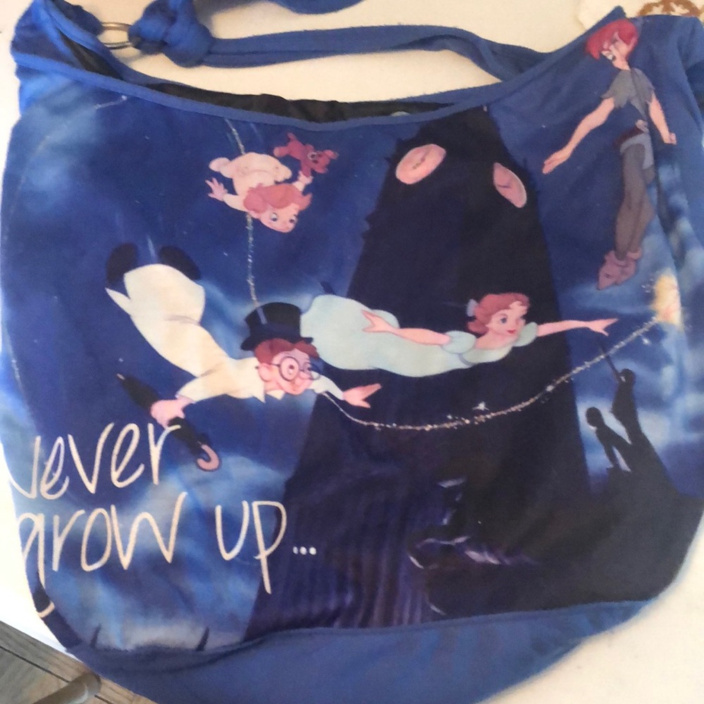 Over the shoulder Peter Pan purse